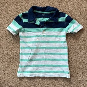 Navy Blue, Light Teal, & White Strip Polo. Carters, Boys size 3T-Small Stain